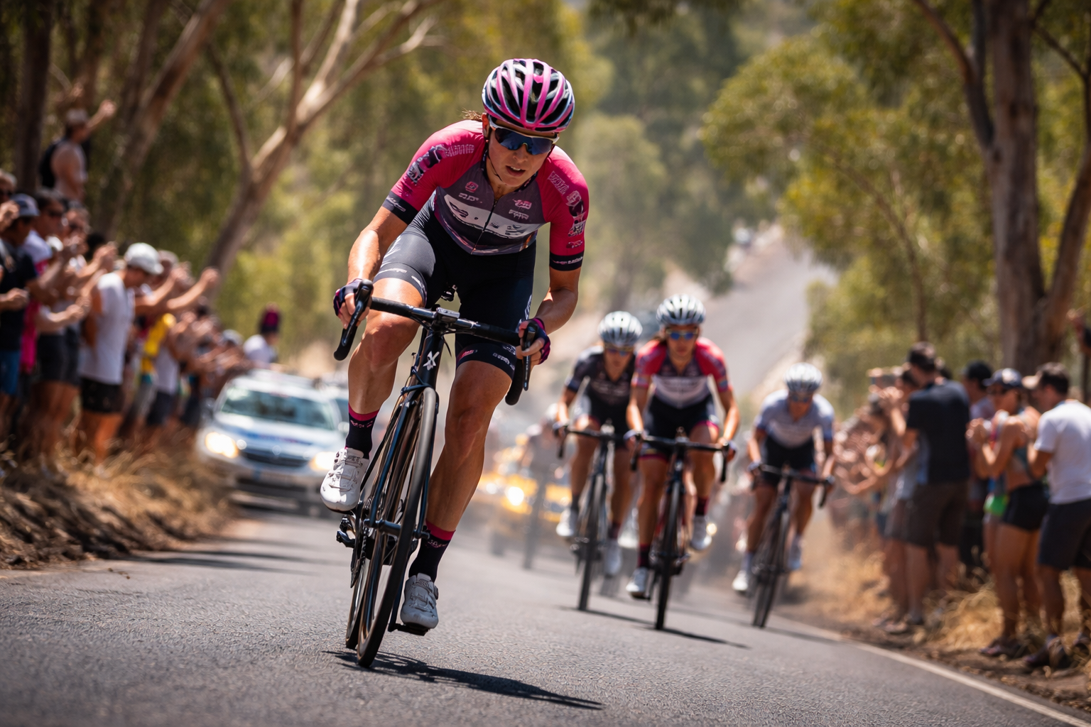 Elite women’s cyclist attacking on Corkscrew Road at 2026 Santos Tour Down Under